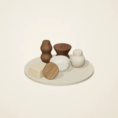 The six parts of Japanese Mingei No. 1 in a loose pile on a round stand