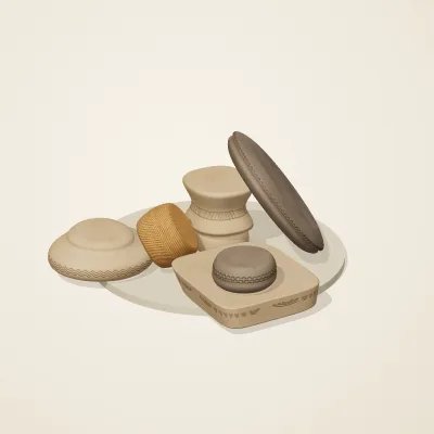 The six parts of Jōmon No. 2 in a loose pile on a round stand