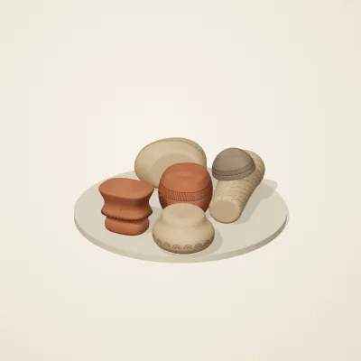 The six parts of Jōmon No. 5 in a loose pile on a round stand