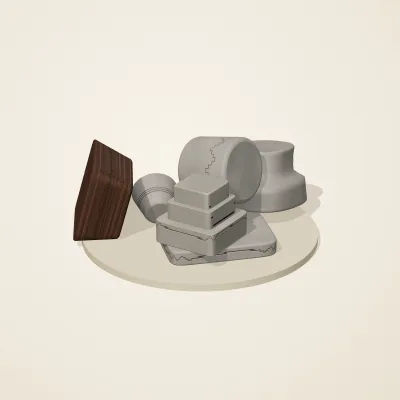 The six parts of Tibetan Mountain No. 11 in a loose pile on a round stand