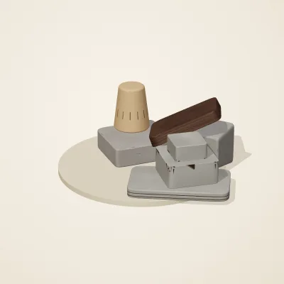The six parts of Tibetan Mountain No. 12 in a loose pile on a round stand