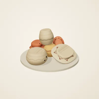 The six parts of Indian Terracotta No. 6 in a loose pile on a round stand