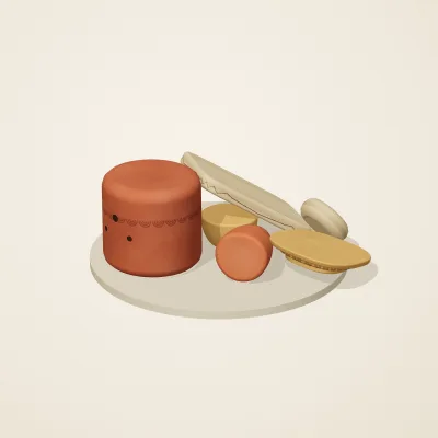 The six parts of Indian Terracotta No. 12 in a loose pile on a round stand