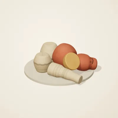 The six parts of Indian Terracotta No. 18 in a loose pile on a round stand