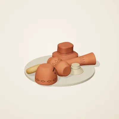 The six parts of Indian Terracotta No. 25 in a loose pile on a round stand