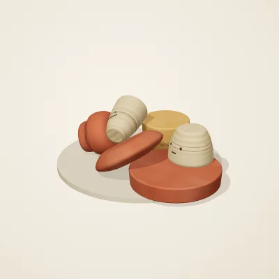 The six parts of Indian Terracotta No. 26 in a loose pile on a round stand