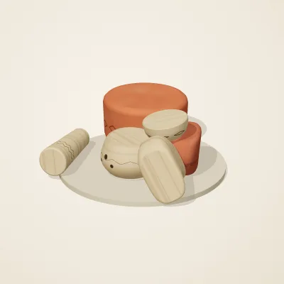 The six parts of Indian Terracotta No. 37 in a loose pile on a round stand