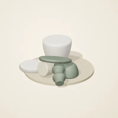 The six parts of Thai Celadon No. 8 in a loose pile on a round stand