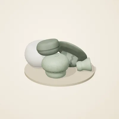 The six parts of Thai Celadon No. 16 in a loose pile on a round stand