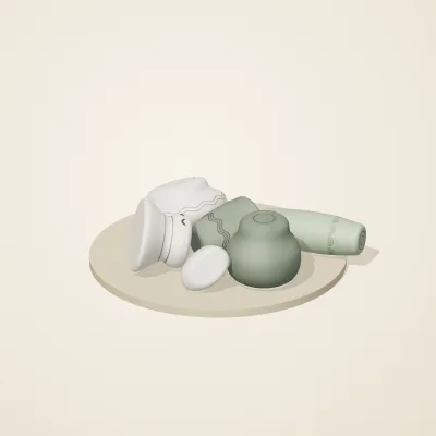 The six parts of Thai Celadon No. 27 in a loose pile on a round stand