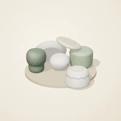 The six parts of Thai Celadon No. 28 in a loose pile on a round stand