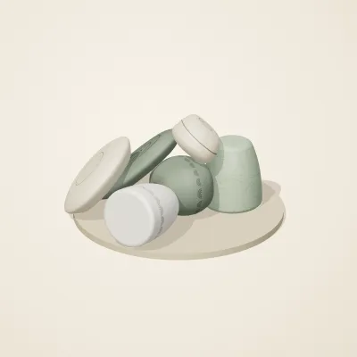 The six parts of Thai Celadon No. 29 in a loose pile on a round stand