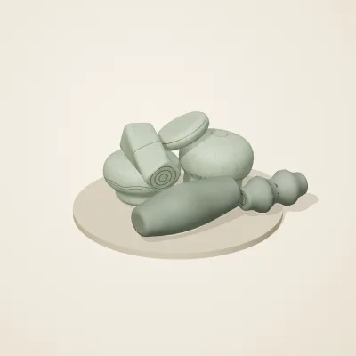 The six parts of Thai Celadon No. 36 in a loose pile on a round stand