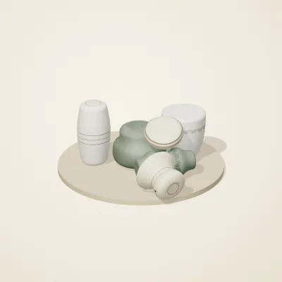 The six parts of Thai Celadon No. 38 in a loose pile on a round stand