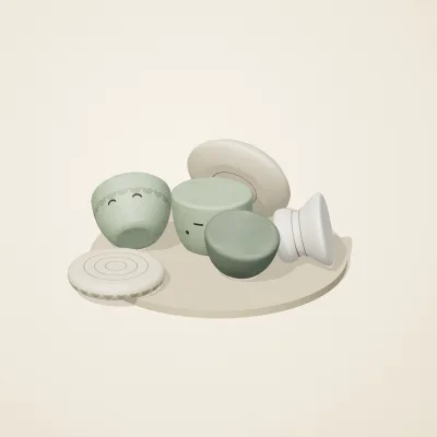 The six parts of Thai Celadon No. 39 in a loose pile on a round stand