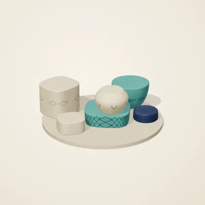 The six parts of Persian Geometry No. 2 in a loose pile on a round stand