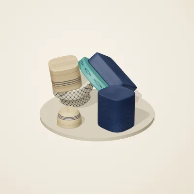 The six parts of Persian Geometry No. 8 in a loose pile on a round stand