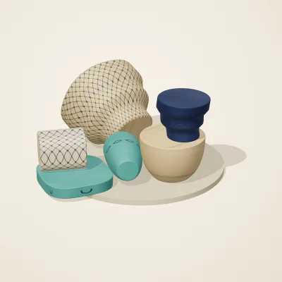 The six parts of Persian Geometry No. 16 in a loose pile on a round stand