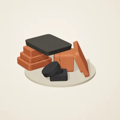 The six parts of Mexica Stone No. 4 in a loose pile on a round stand