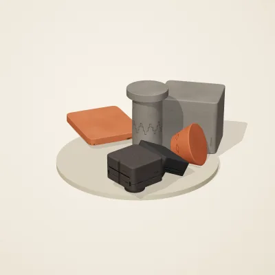 The six parts of Mexica Stone No. 28 in a loose pile on a round stand