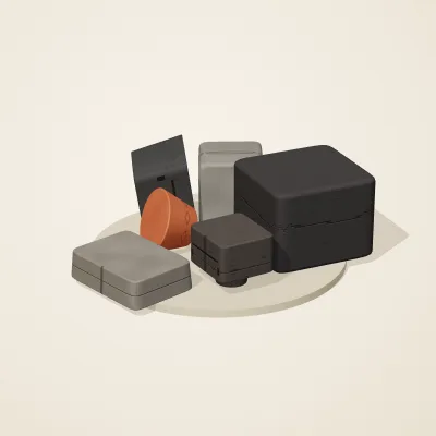 The six parts of Mexica Stone No. 37 in a loose pile on a round stand