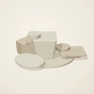 The six parts of Maya Limestone No. 4 in a loose pile on a round stand
