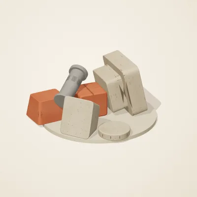 The six parts of Maya Limestone No. 12 in a loose pile on a round stand