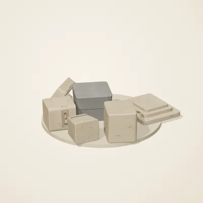 The six parts of Maya Limestone No. 13 in a loose pile on a round stand