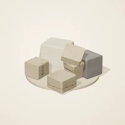 The six parts of Maya Limestone No. 16 in a loose pile on a round stand