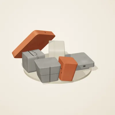 The six parts of Maya Limestone No. 27 in a loose pile on a round stand