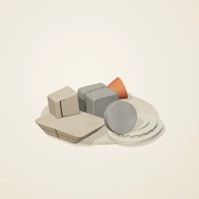 The six parts of Maya Limestone No. 39 in a loose pile on a round stand