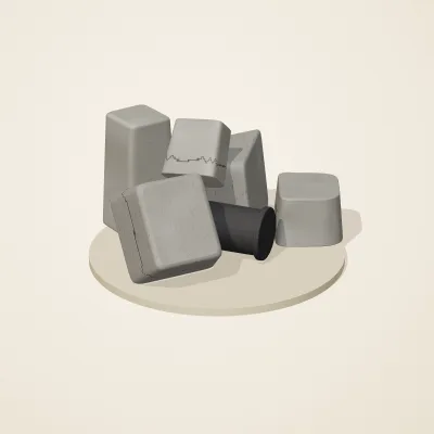 The six parts of Inca Masonry No. 2 in a loose pile on a round stand