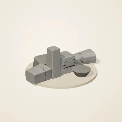 The six parts of Inca Masonry No. 3 in a loose pile on a round stand