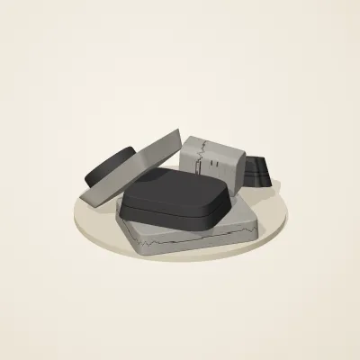 The six parts of Inca Masonry No. 10 in a loose pile on a round stand