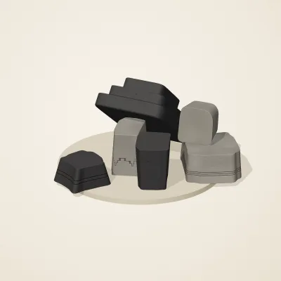 The six parts of Inca Masonry No. 18 in a loose pile on a round stand