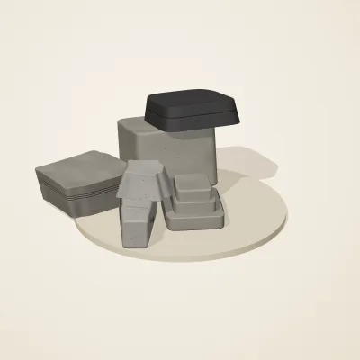 The six parts of Inca Masonry No. 26 in a loose pile on a round stand