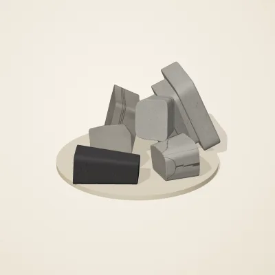 The six parts of Inca Masonry No. 32 in a loose pile on a round stand