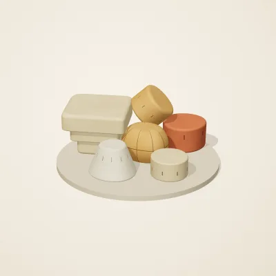 The six parts of Sumerian Clay No. 15 in a loose pile on a round stand