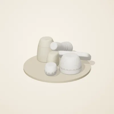 The six parts of Cycladic Forms No. 3 in a loose pile on a round stand