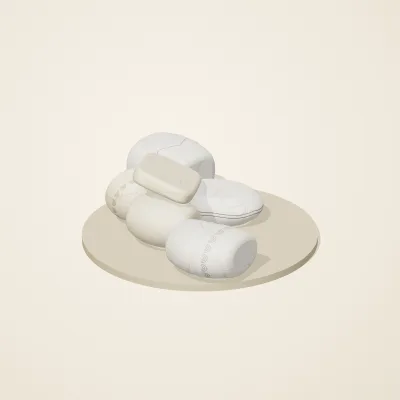 The six parts of Cycladic Forms No. 4 in a loose pile on a round stand