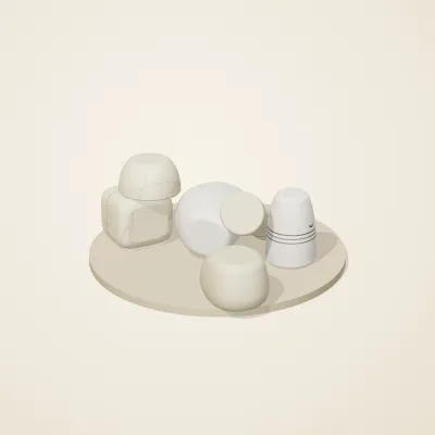 The six parts of Cycladic Forms No. 9 in a loose pile on a round stand