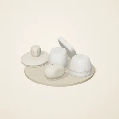 The six parts of Cycladic Forms No. 14 in a loose pile on a round stand