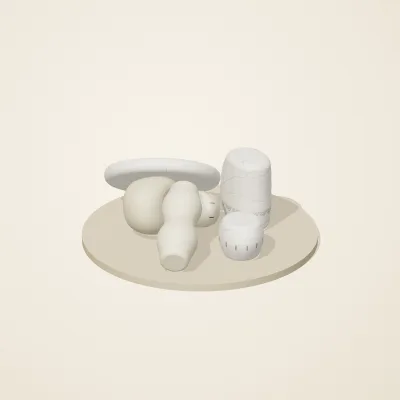 The six parts of Cycladic Forms No. 18 in a loose pile on a round stand