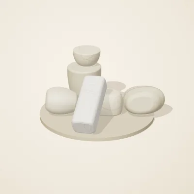 The six parts of Cycladic Forms No. 24 in a loose pile on a round stand