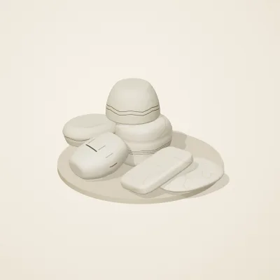 The six parts of Cycladic Forms No. 25 in a loose pile on a round stand