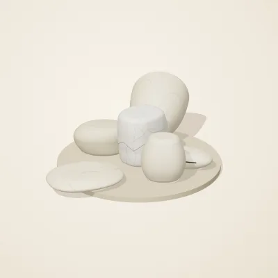 The six parts of Cycladic Forms No. 27 in a loose pile on a round stand