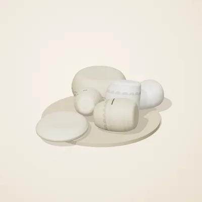 The six parts of Cycladic Forms No. 30 in a loose pile on a round stand