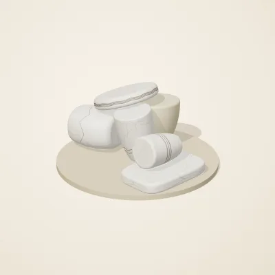 The six parts of Cycladic Forms No. 39 in a loose pile on a round stand