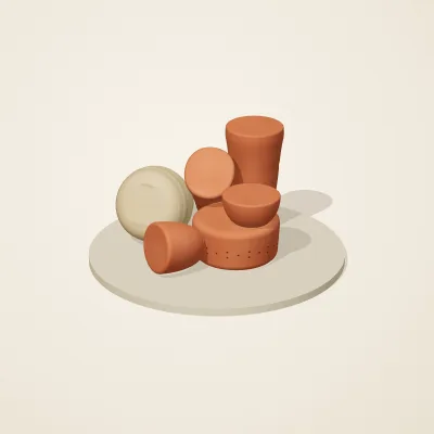 The six parts of Etruscan Terracotta No. 9 in a loose pile on a round stand