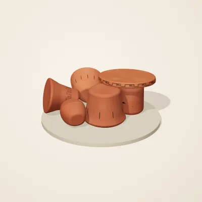 The six parts of Etruscan Terracotta No. 29 in a loose pile on a round stand